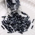 Glossy black glass bugle beads for DIY jewelry making in a decorative white dish - #08 Style (Threaded Tube)