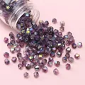 4mm purple AB bicone glass beads for DIY jewelry making spilling from a bottle - Deep purple