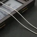 Macro detail of 1.8mm silver spring snake chain for DIY jewelry making accessories - 20cm / Silver