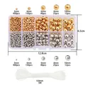 Detail van DIY-kralenset met gouden en zilveren bollen in diverse maten en doosje - Metalen Ronde Kralen Meerdere Maten (BDH200-BDH201)
