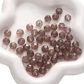 Faceted 10mm glass beads in translucent grey-purple with green inclusions for DIY jewelry - Black