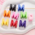 Colorful acrylic letter M beads for DIY jewelry making in a white wavy tray - Letter M / 500g/Pack (21x21mm, Hole 5mm) / Multicolor Mixed