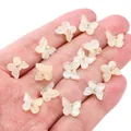 Pearlescent white butterfly charm with golden ring for DIY jewelry making and crafts - 10×11mm / Yellow Blue Tears Effect