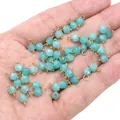 Lichtblauwe 4mm facetgeslepen natuursteen hanger met gouden oog op de handpalm - Amazoniet