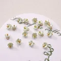 Mini resin lily of the valley flower pendants in light green with golden center beads - 7mm / Five-petal Flower Green