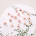 Pink resin flower charms with gold centers and small loops for DIY jewelry making - 5mm / Four-petal Flower Pink