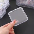 Hand holding small clear square plastic organizer box for jewelry and small parts - Large Size (8.5x8.5cm) / Clear