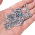 Irregular grayish blue glass stone beads for DIY jewelry making held in hand - Aquamarine