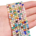 Mixed color round cat eye beads in palm for DIY jewelry making and bracelet material - 4mm Mixed Colors (45 Pieces/Pack)