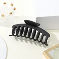 Detail view of the 11cm matte black claw clip featuring a sturdy double-row tooth structure - Black