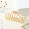 Detail of 11cm matte beige shark hair claw clip with rounded teeth for thick hair - Beige