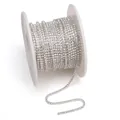 Chaîne à griffes argentée avec strass clairs sur bobine pour bijoux DIY et vêtements - 1.5mm (1 Mètre/Paquet) / Argent / Zircone Blanche