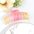 Matte large claw clip featuring a soft pink and yellow gradient for thick hair - Pink