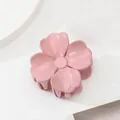 Close-up of pink flower hair claw clip with glossy resin finish and spring teeth - Five Petal Flower Soft Glossy (Pink) / Pink