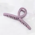 Close-up of a 13cm matte lavender hair claw clip with a twisted ribbon-style design - Violet
