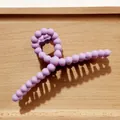 Matte light purple beaded hair claw clip with a spiral bubble design for women - Fuschia