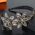 Detail of sparkling crystal flower headband with non-slip teeth for secure hold - Gray