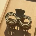 Close-up of matte taupe hair claw clip with double-ring structure and bead texture on wood - Light Coffee