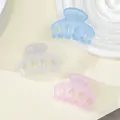 Detailed view of three mini matte hair claws in pastel blue, white, and soft pink colors - Light Blue Translucent White Light Pink Mix (199G)
