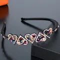 Close-up of heart-shaped headband with colorful rhinestones and non-slip inner teeth - Deep Multicolor
