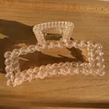 Rectangle matte bubble claw clip in translucent peach pink with golden spring - Transparent Orange