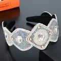 Macro detail of luxury wide headband featuring intricate rhinestone and crystal flower patterns - Milky White