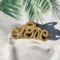 Close-up of khaki matte LOVE letter hair claw clip on white fabric with leaf shadow - Light Coffee