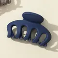 Detail of 7cm matte navy blue pumpkin claw clip showing its textured finish and sturdy teeth - Dark Blue