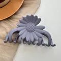Macro detail of daisy matte hair claw clip in Morandi grey-purple on ceramic plate - Grey Purple