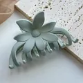 Macro detail of mint green matte flower hair claw clip with a resin texture - Frosted 3D Flower / Mint Green