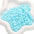 Cuentas redondas azul claro para relleno DIY en una bandeja blanca en forma de estrella - Sin Agujero / 8mm (30g/Aprox. 100 Piezas/Paquete) / Azul claro