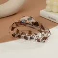 Elegante pinza de pelo con estampado de leopardo y muelle dorado para peinado chic - Letra B