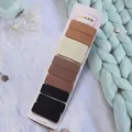 Detail view of 10-piece matte earth tone BB hair clips set on display card - Solid Square