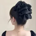 Übergroße schwarze Haarklammer aus Spitze und Seersucker für elegante Dutt-Frisuren - Schwarz