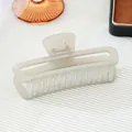 Glossy light grey marble pattern rectangular hollow hair claw clip for elegant styling - Gray