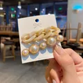 Detail of Korean style hair clips with marble chain and gradient pearls on card - Pearl And Cream Chain