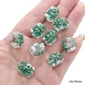 Christmas glass barrel bead with tree and snowflake patterns held in palm 14x16mm - Snowflake Tree Bead (#33) / 1 Piece (14x16mm)