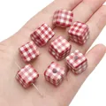 Red checkered acrylic cube beads for DIY jewelry making held in a person's palm - 14x14mm / Red Gingham Cube / 2 Pcs/Set