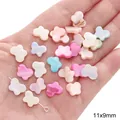 Kleurrijke 11x9mm vlindervormige schelpkralen voor DIY-sieraden op een hand - Vlinder Stijl / 11x9mm (10 Stuks) / Willekeurig Gemengde Kleuren