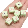 Perline quadrate in acrilico verde chiaro con fiori rosa e fiocchi per bracciali DIY - Cubo con Fiocco Floreale Verde