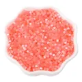 Coral pink tubular cat eye glass beads in a white floral dish for DIY jewelry making - 2.5mm, Hole approx 1mm, 450g/Pack, Approx 33000 Pieces / Orange Red