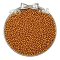 Bulk metallic golden seed beads for jewelry DIY displayed in a stylish round tray - Deep Gold