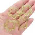 Ciondoli a stella in acrilico giallo con bordi ondulati per gioielli fai da te e artigianato - 30mm (20 Pezzi/Confezione) / Giallo