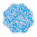 Blue gradient DIY fuse beads in a petal-shaped ceramic bowl for jewelry making - 2.5mm, Hole approx 1mm, 450g/Pack, Approx 33000 Pieces / Deep Sea Blue Mix