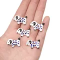 Five small handmade ceramic dalmatian puppy buttons for DIY jewelry and clothing craft - Royal Blue Spotted Dog