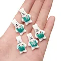 Five pieces of handmade white rabbit ceramic buttons with blue aprons for DIY crafts - Green Bib Rabbit