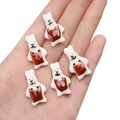 Handmade white ceramic rabbit buttons with brown apron for DIY crafts on palm - Coffee Bib Rabbit