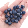Deep blue 10mm octagonal geometric wooden beads for DIY jewelry making in hand - 10mm / Dark Blue