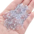 Iridescent square glass crystal beads for DIY jewelry making shown on a palm for scale - 1x3mm (1g/Pack, Approx. 50 Pcs) / Flat Square Style (BBA118) / Light Blue