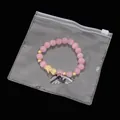 Pink matte bead bracelet with gold PiXiu charm in a clear plastic zipper storage bag - 13x13cm (10 Pieces/Pack) / Clear